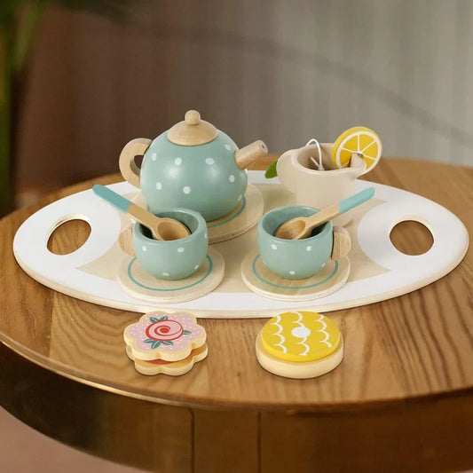 CSSV FILE afternoon tea set with teapot, cups, and saucers arranged on a table for a stylish tea time presentation.
